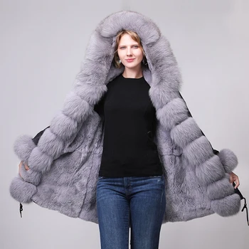 2019 ziemas jaka ir sieviete, ir lielas kažokādas dvieli. Tur ir PU ar apkakli