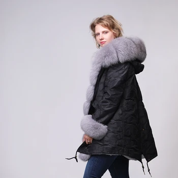 2019 ziemas jaka ir sieviete, ir lielas kažokādas dvieli. Tur ir PU ar apkakli